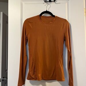 Lululemon Nulu Long sleeve rust color size 6